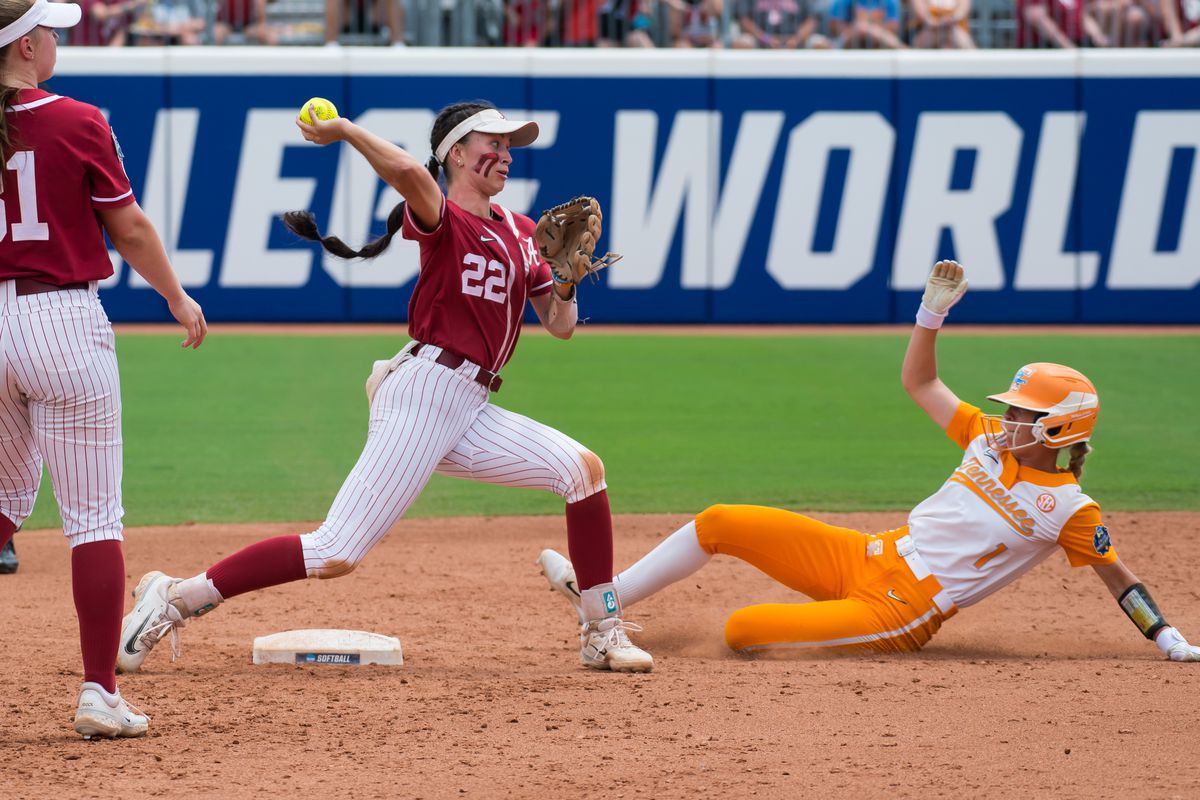 Players from Tennessee and Alabama in action during the College World Series.