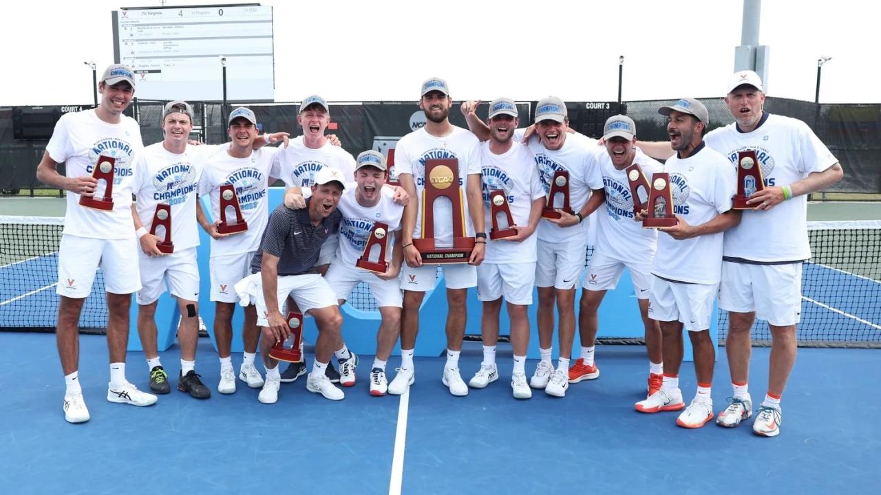 Players from Virginia celebrating the national championship in college tennis.